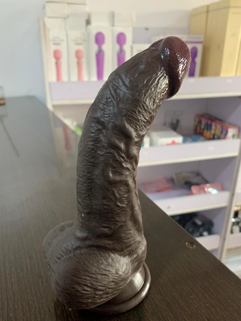Manual chocolate curved silicon dildo