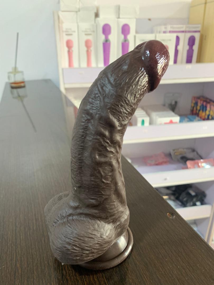 Manual chocolate curved silicon dildo